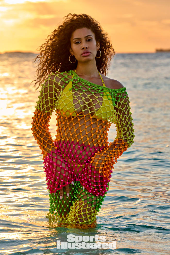 Leyna Bloom was photographed by Yu Tsai in Belize. Swimsuit by Navy Ray. Dress by Celia B. Earrings by 8 Other Reasons.
